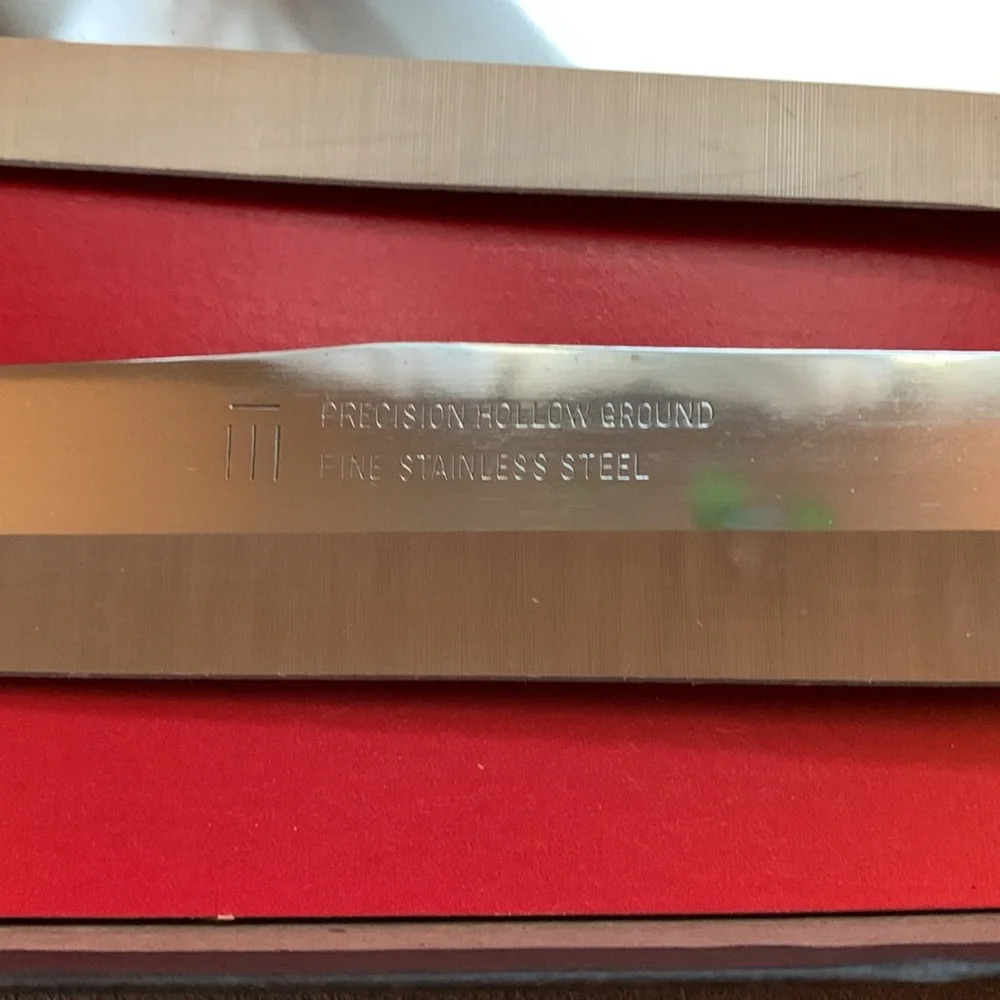Set of Maxam carving knives in original box, blades approximately 6” & 8”